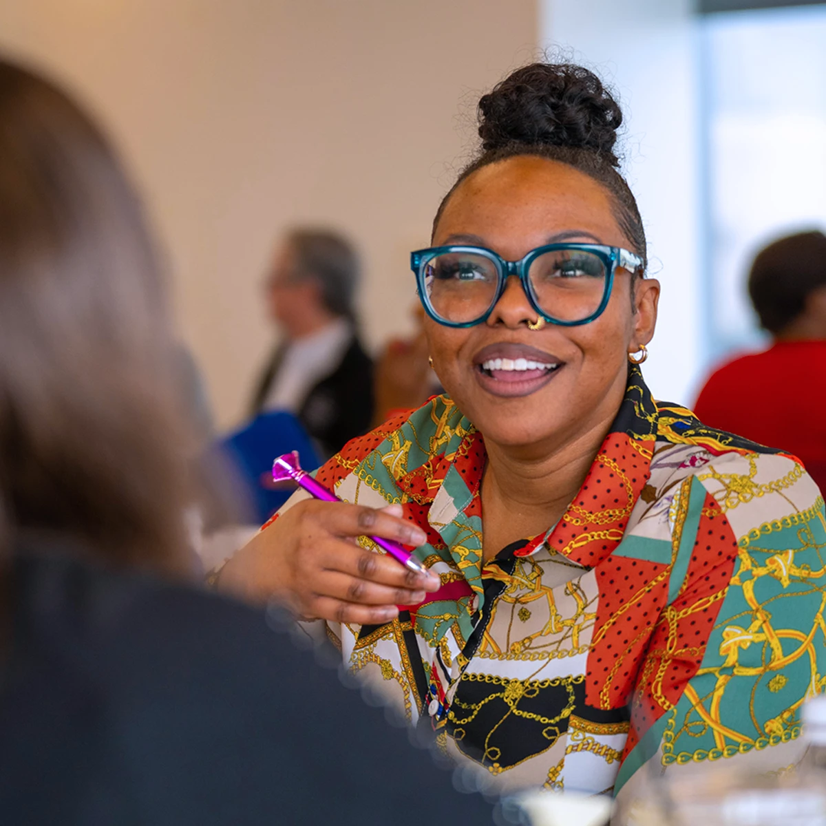 Participant in conversation at event