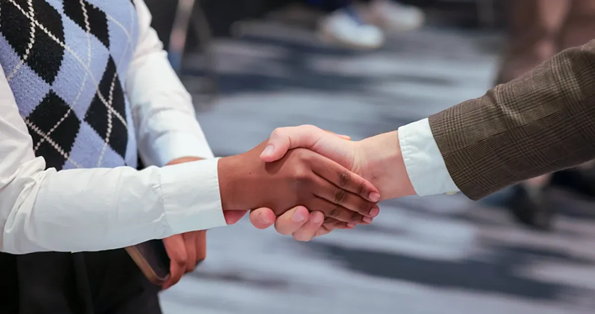 Close up of a handshake.