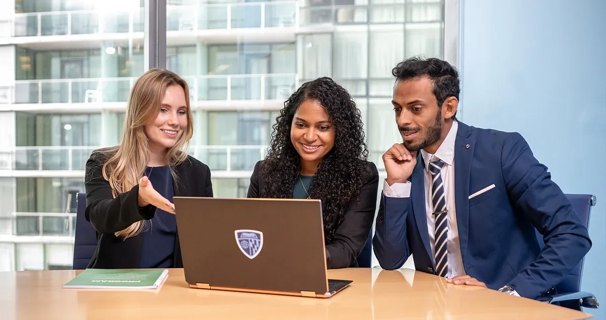 Students working together at a table.