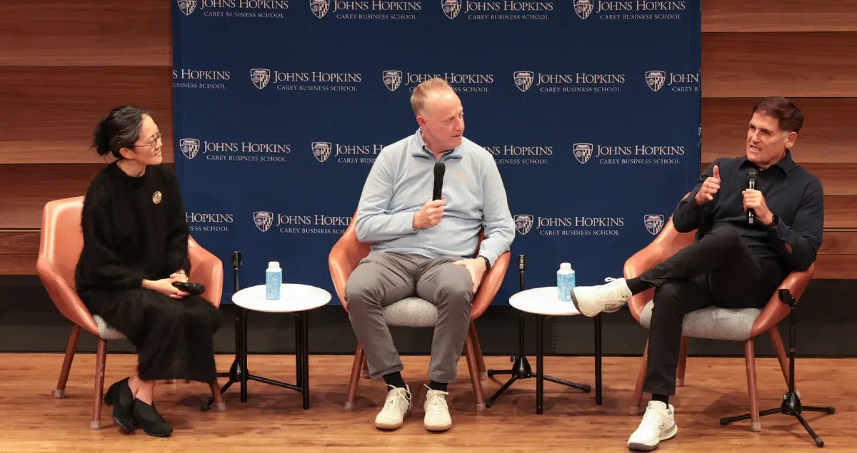 Fireside chat with three participants on stage in D.C.