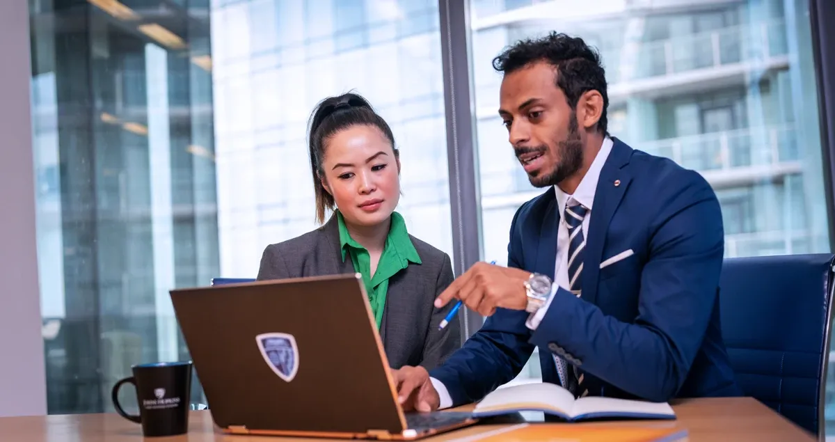 Students working together at a computer