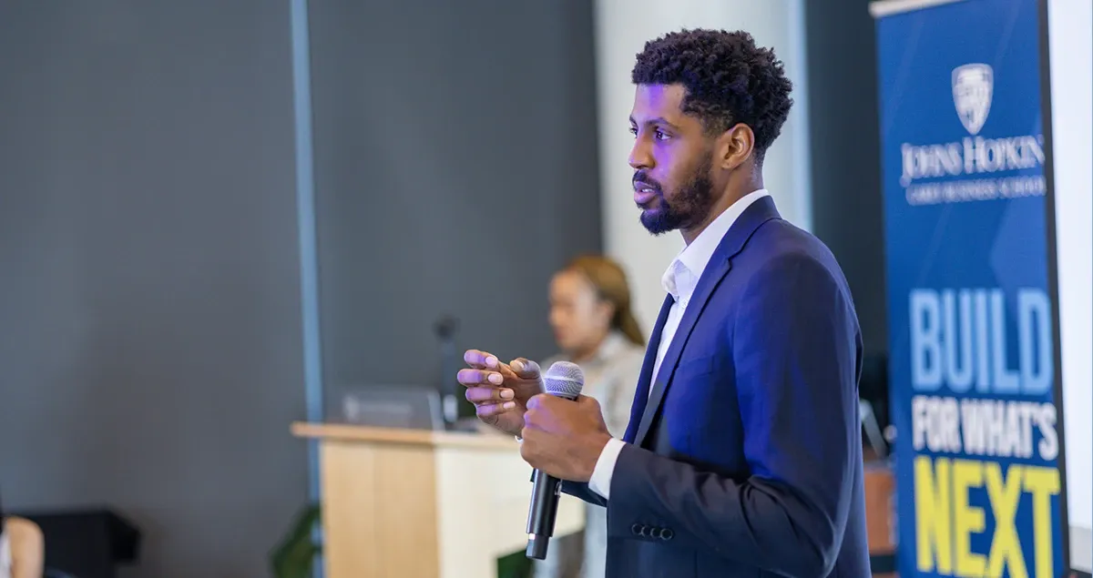 Student presenting at event