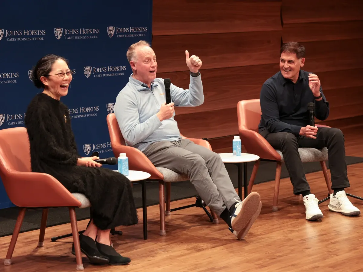 Panel discussion on stage at Johns Hopkins Bloomberg Center