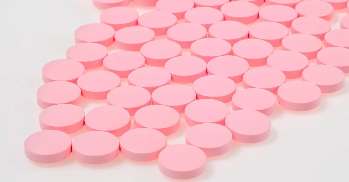 pink tablet on a surface