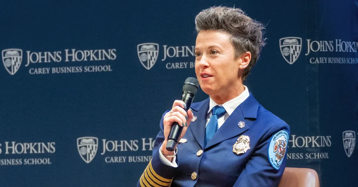 First responder speaks on stage at HCLF event
