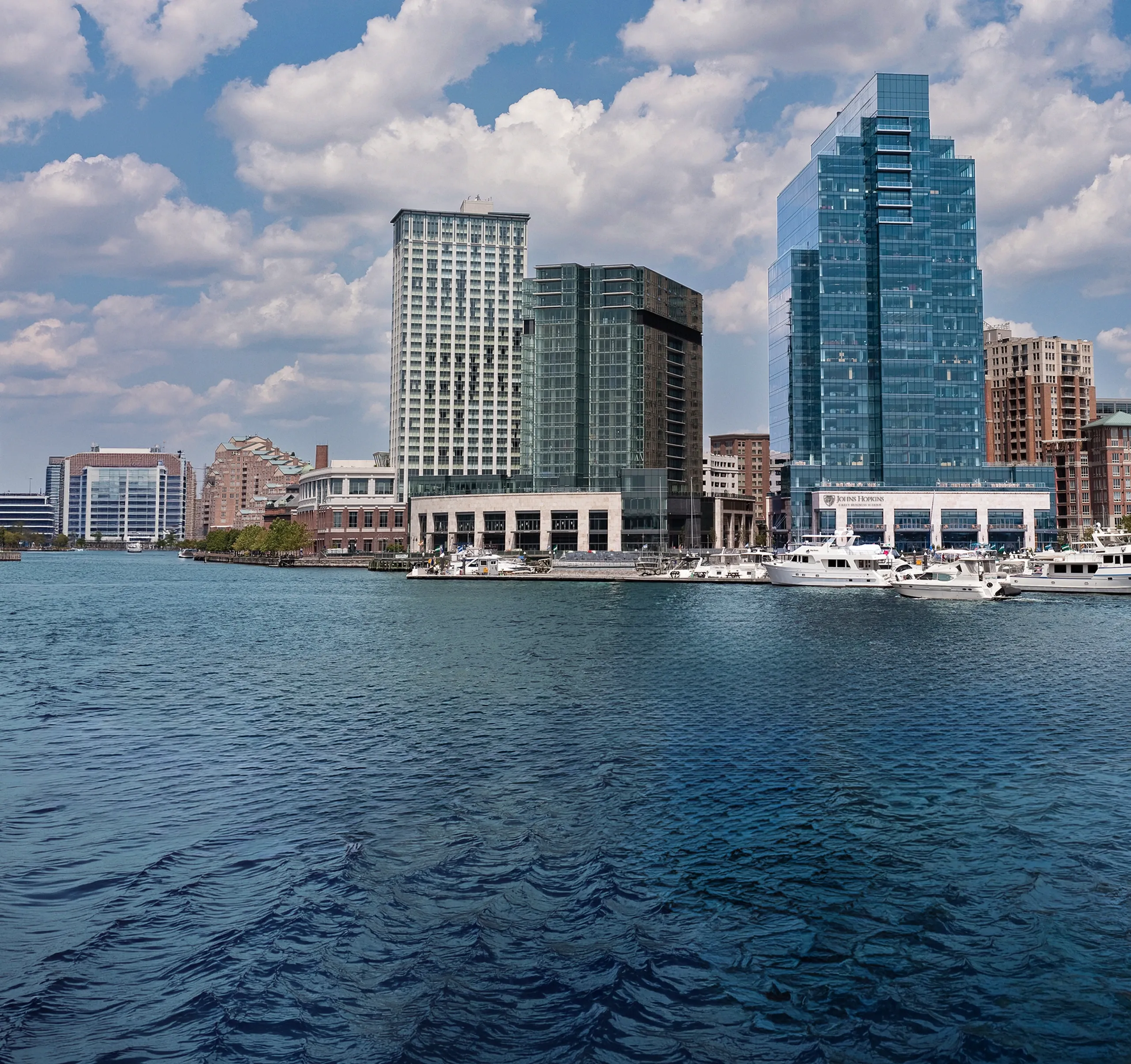 Johns Hopkins Carey Business School in the Baltimore waterfront skyline