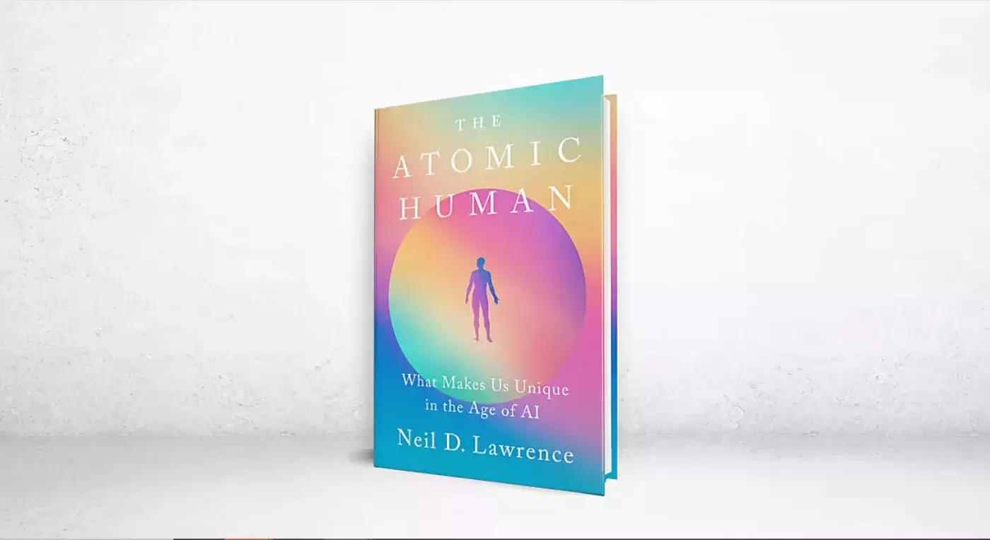 A multicolored cover of a book called Atomic Human