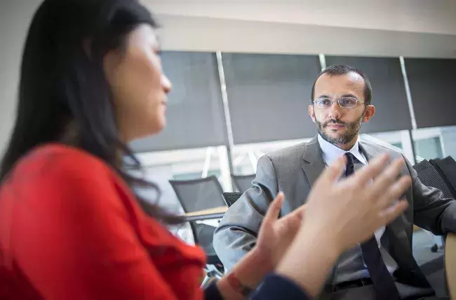 professor listening to his student talking