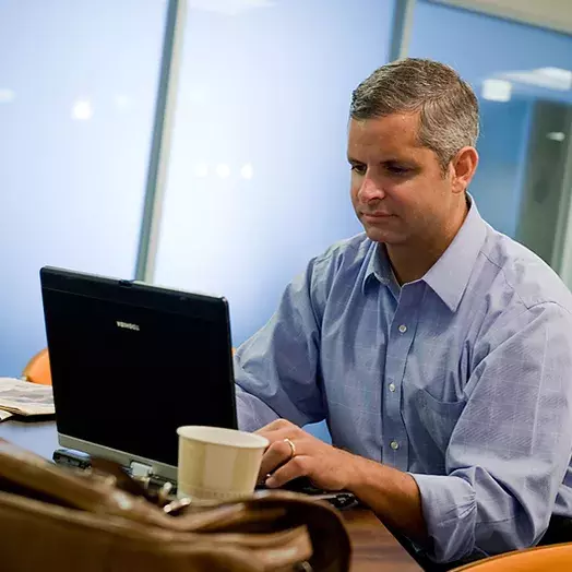 mba student working on his computer