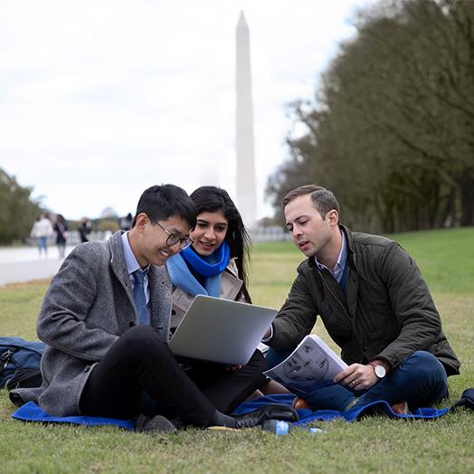 SAIS image of students on lawn at Washington Monument
