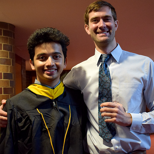 Cameron Owen (MS in Health Care Management ’18) and Pratik Pradhan (MS in Health Care Management ’18) standing together in a portrait