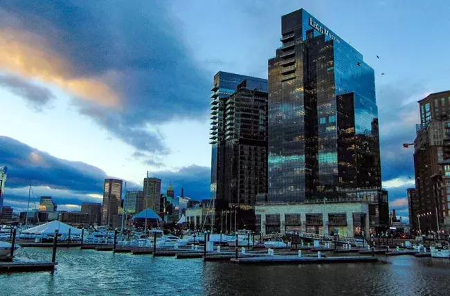 carey building from harbor at dusk