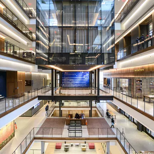 Bloomberg Center 555 Penn in Washington DC shot of an cavernous many floored interior space.