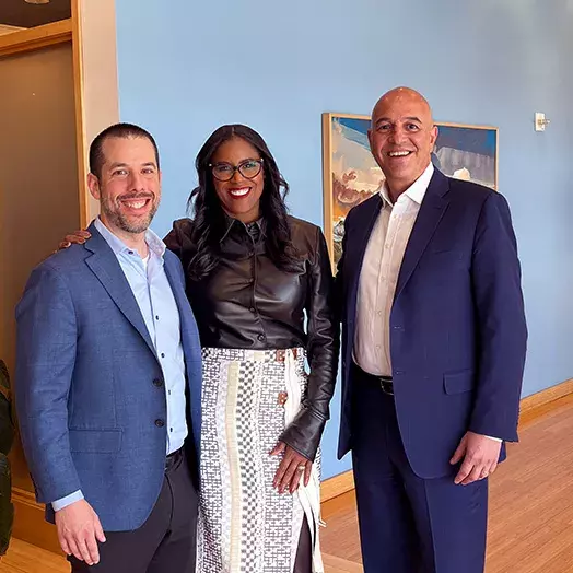 TIAA ceo Thasunda Brown Duckett with Steven Cohen and Dean Alexander Triantis posing