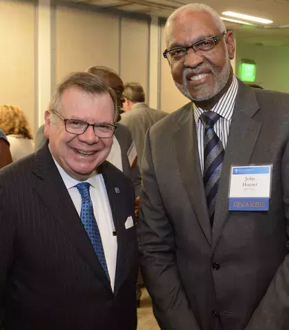 John Hunter speaker at diversity event with Bernard T. Ferrari, dean emeritus of the Johns Hopkins Carey Business School posing