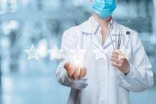 doctor rating article doctor in labcoat and mask with five stars